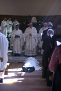Deacon Gareth prostrates himself while the congregation sing the Litany of Saints