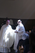 Archbishop Peter presents the new Fr Gareth to the congregation